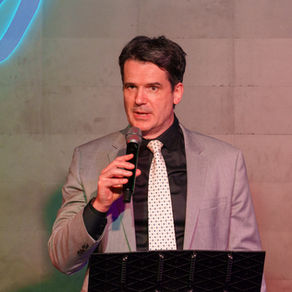 Dr. Vadim Gushchin speaking at the Abdominal Cancers Alliance's event: Living Proof 2026