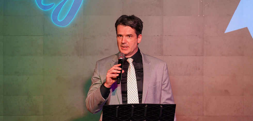 Dr. Vadim Gushchin speaking at the Abdominal Cancers Alliance's event: Living Proof 2026
