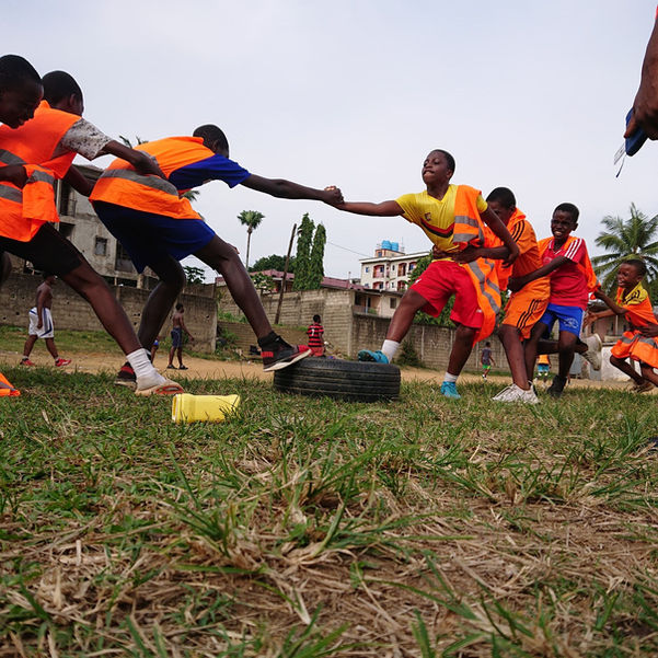 Afidi summer camp participants playing outdoor games in Cameroon, Central Africa