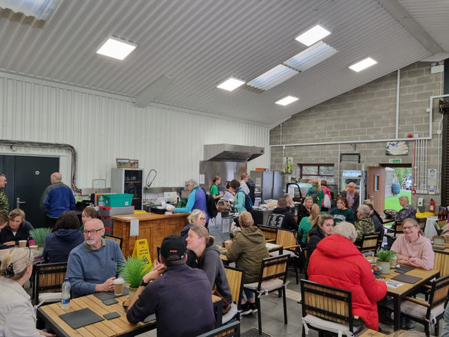 Guests seated in the grape reception as an example for what to expect during a coffee morning.