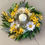 Thumbnail: Daisy Wreath with Hurricane Vase and Candle