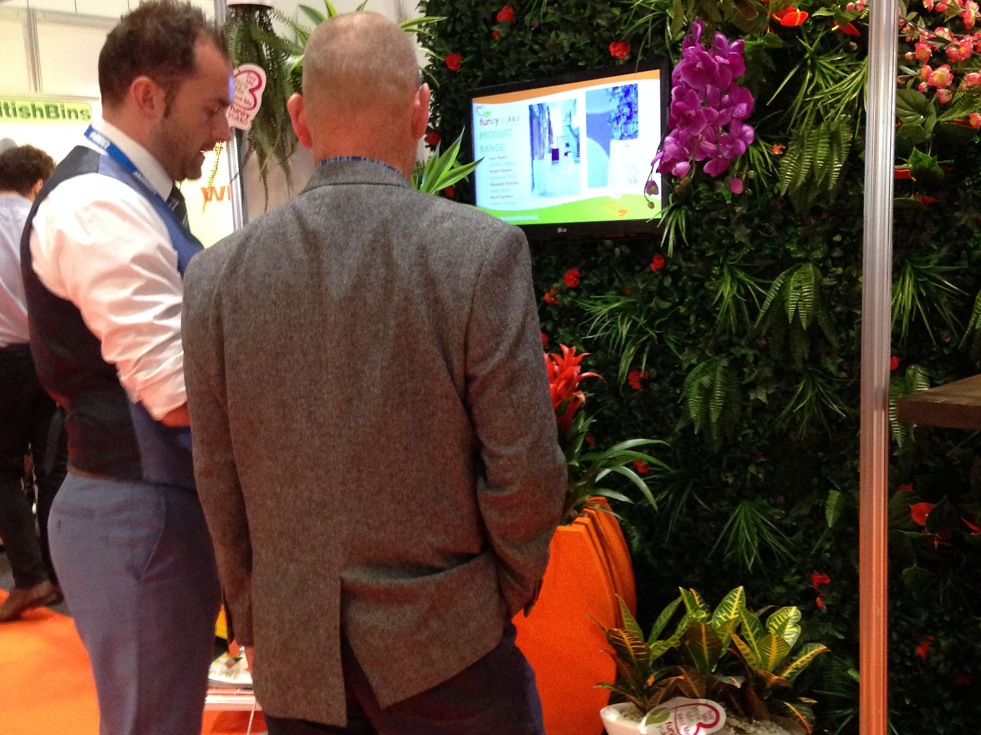 MD Daniel speaking to a visitor