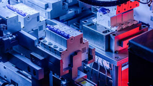 Close-up of an industrial machine with circuit breakers