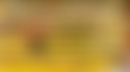 Grocery store shelves filled with assorted mustard bottles