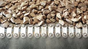 Close-up of conveyor belt splice joint in a crushing plant