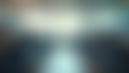 A quiet office space showing empty desks and a laptop, symbolizing employee turnover