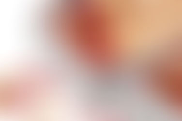 Open matchbox with red-tipped matches spilling out