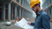 Experienced engineer reviewing project plans
