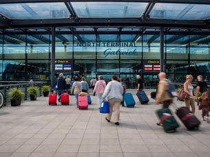 Travellers arriving at Gatwick Airport before travelling to Central London.