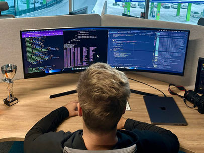 Children learning coding through Roblox, Minecraft, and Python at Martin Filippov School