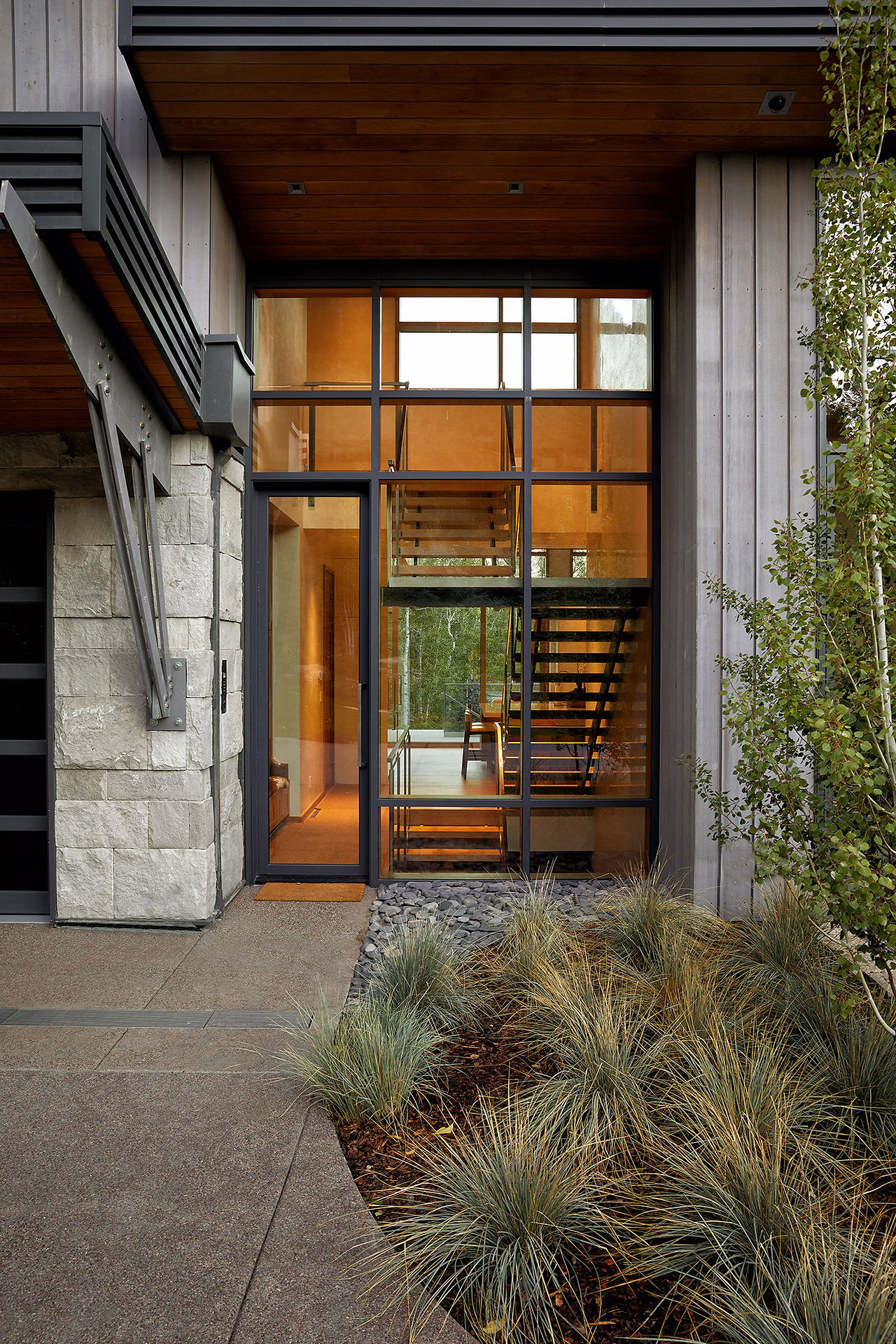 Shadow Mountain Residence secondary front entrance next to garage that enters into kitchen