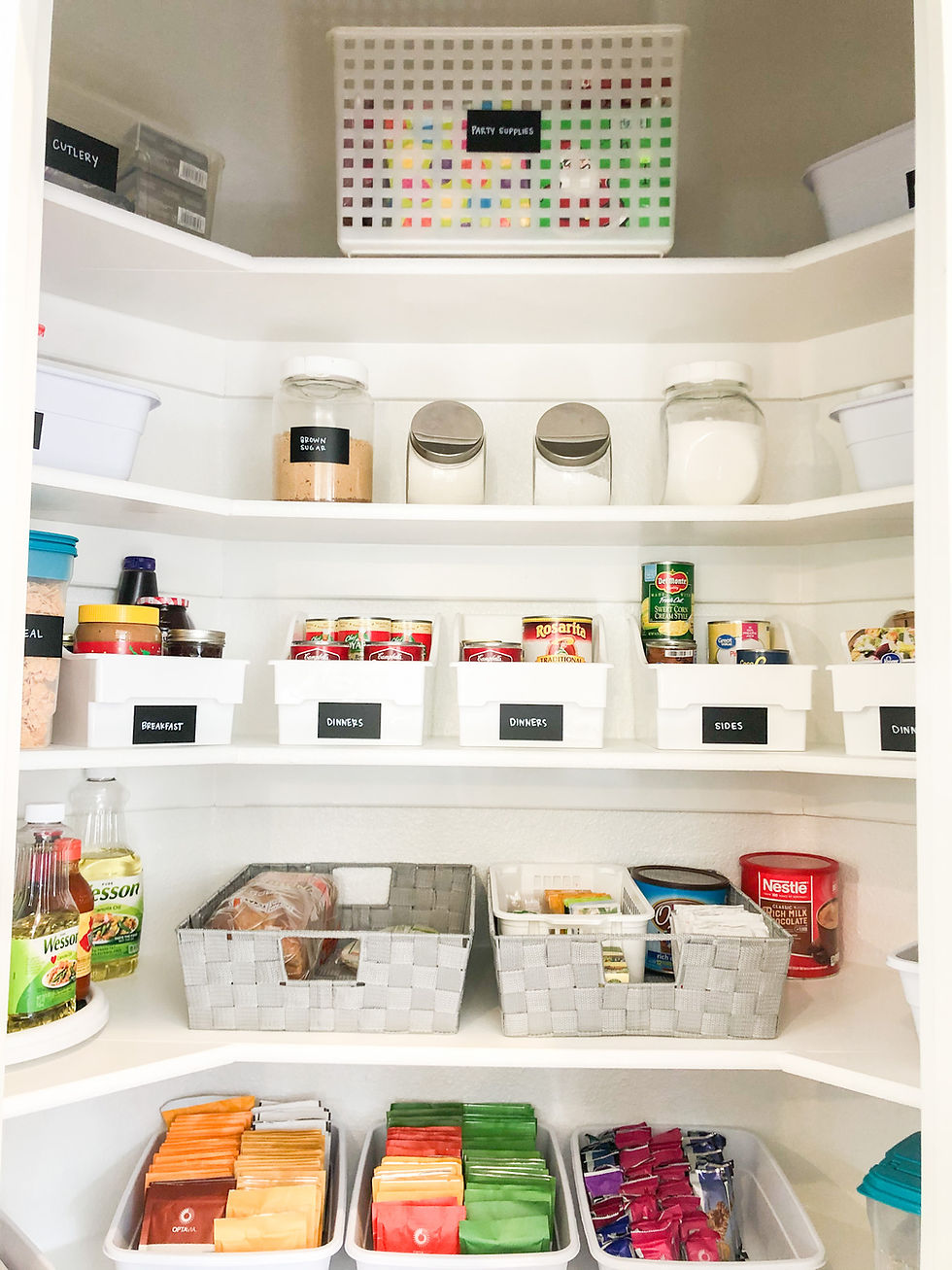 organized pantry form the front with repurposed containers.