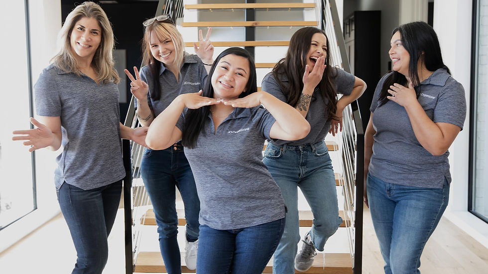 client saying goodby to professional organizer team