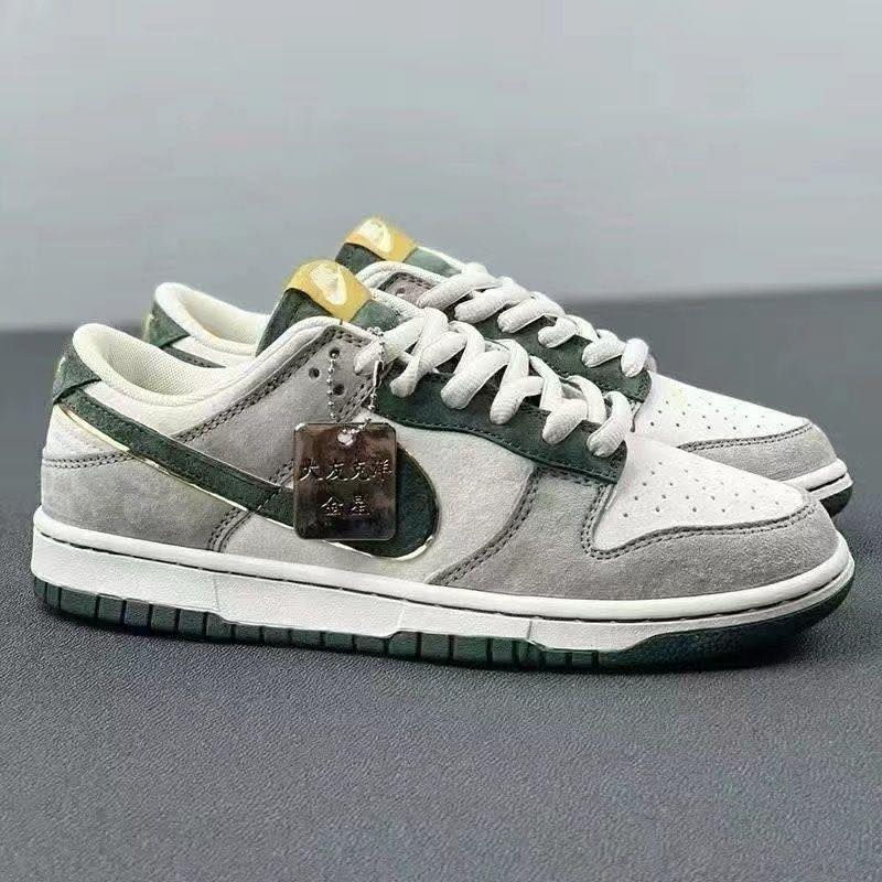 “Dunk Low Retro Premium Off white with orange detailing – classic streetwear sneaker”