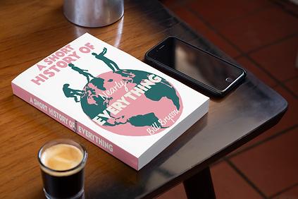 mockup-of-a-book-on-a-table-with-a-phone-and-a-coffee-33904.png