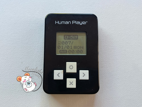 RESERVED: Bandai Japan Human Player Black Virtual Pet 2007