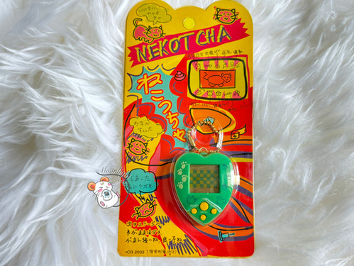 1997年CAT DIGITAL PET Nyanchi 　にゃんち　VISGO Neko Cat Uniyatta Orange Takara Tomy Virtual Pet 1997