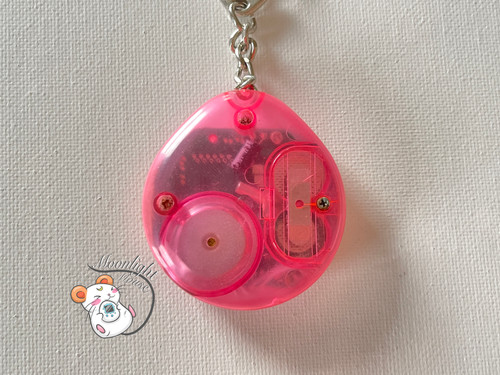 Baby Dino Pink Virtual Pet Tamagotchi Japan 1997 | Moonlight