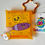 Thumbnail: Tamagotchi Exhibition Pink Purple Orange Pouch Bag Keychain Bandai Japan 2026