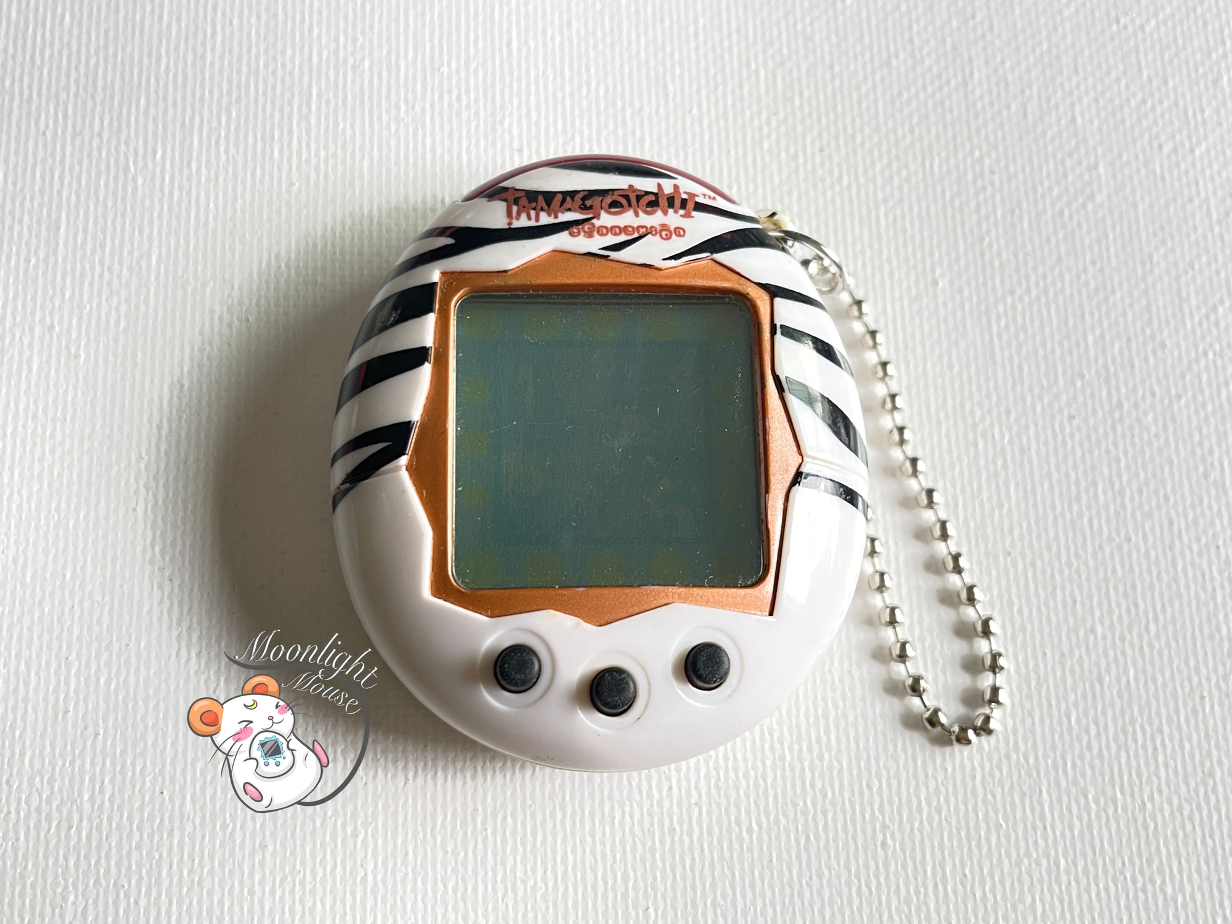 Tamagotchi Connection v2 English Zebra White Australia Shell 2005
