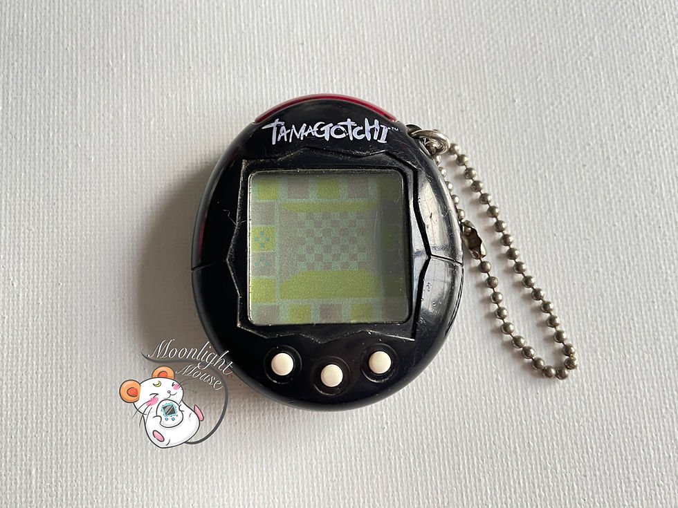 Thumbnail: Tamagotchi Connection v1 English Black Shell 2004