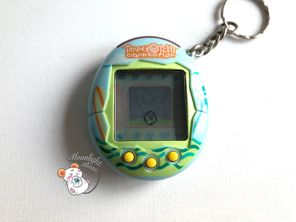 Thumbnail: Tamagotchi Connection v2 English Blue Surfboard Shell 2005