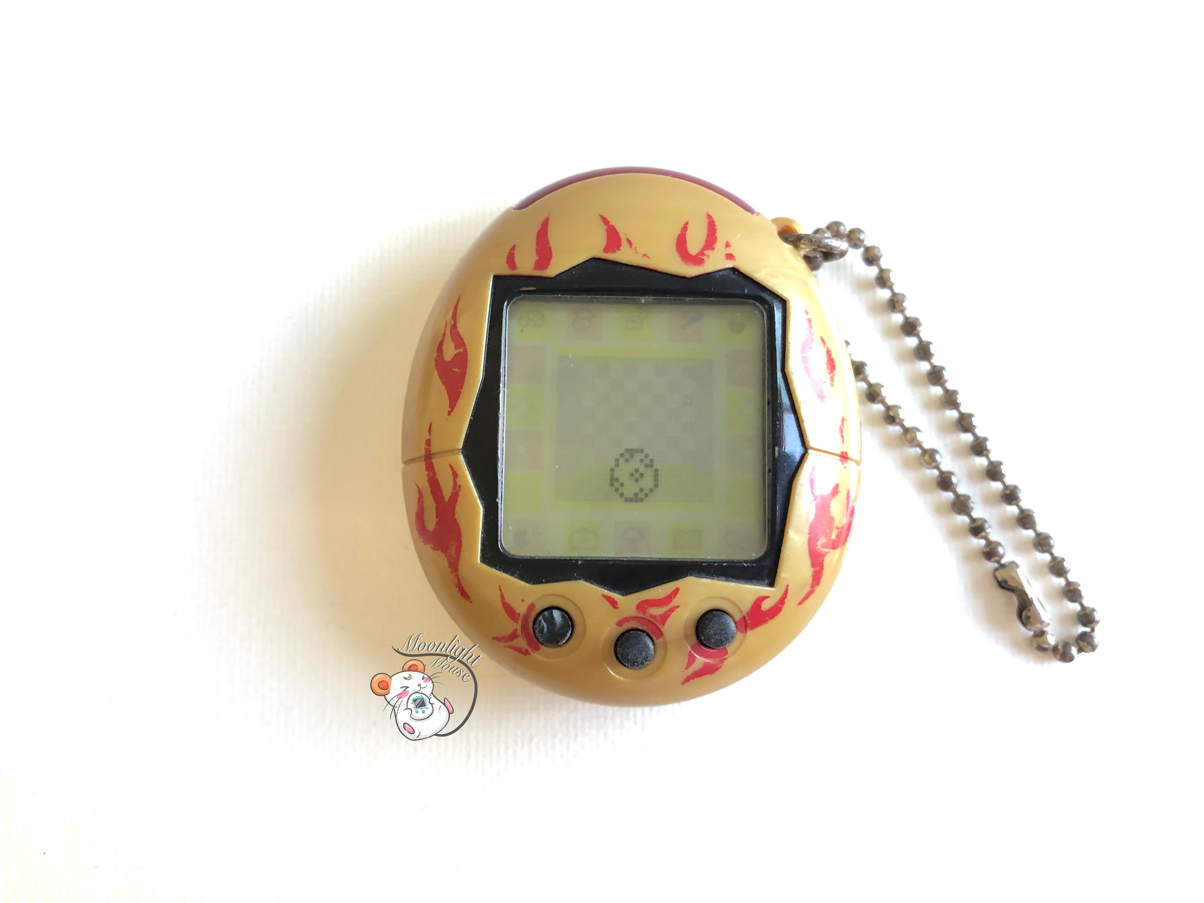 Tamagotchi Connection v2 English Gold Flames Australia Shell 2005 (READ)