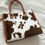 Thumbnail: Fluffy Cow Leather Trim Tote Bag
