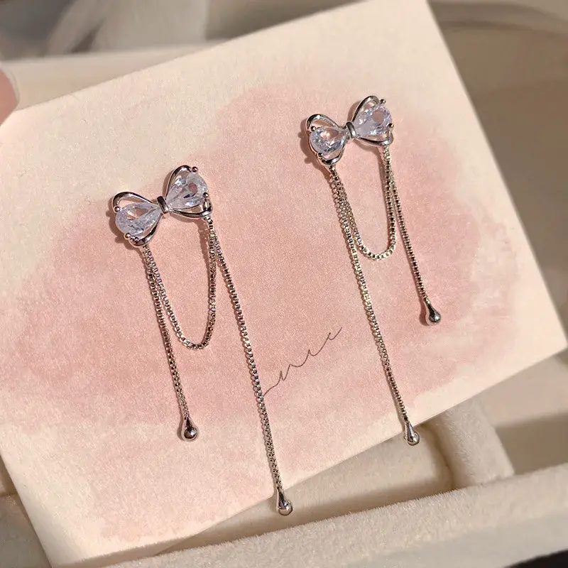 Silver Bow Tassel Earrings