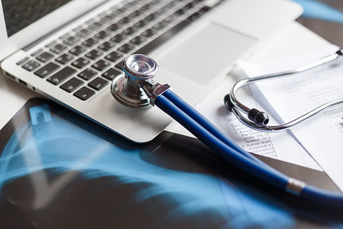 doctors-desktop-with-medical-equipment-c