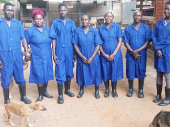 Animal rescue and protection organization in Uganda at the animal shelter showing their new uniforms.