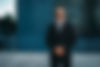 male-bodyguard-suit-security-earpiece-sunglasses-outdoors.jpg