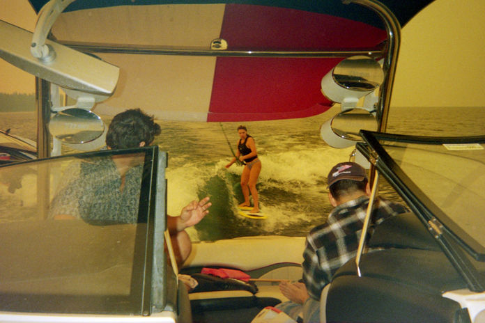 Wake Surfing in Lake Tahoe, California, hazey sky, afternoon ride