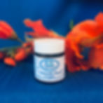 A brown cream jar with a white label that says Smooth Face Cream with the Casaroma Logo
