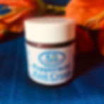 A brown glass jar with a white label that says Peppermint Foot Cream with the Casaroma Logo