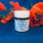 A brown cream jar with a white label that says Forever Young Cream with the Casaroma Logo