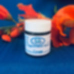 A brown cream jar with a white label that says Aggravated Skin Cream with the Casaroma Logo