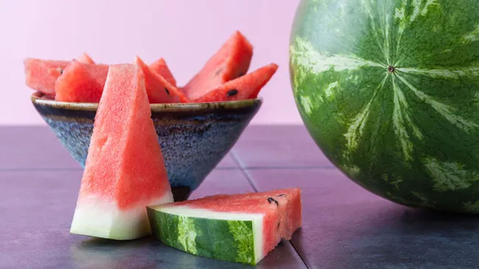 sliced watermelon and whole watermelon
