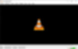 VLC media player interface with orange and white traffic cone logo centered on a black background. Playback controls visible below.