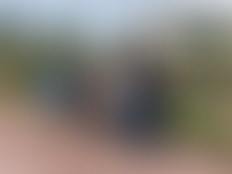 Group of researchers in front of primary school in Musanze, Rwanda