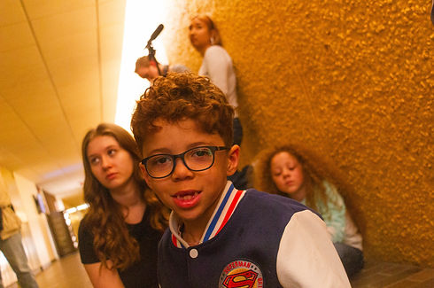 13 Dollars extras with the Producer and Sound Team in the background