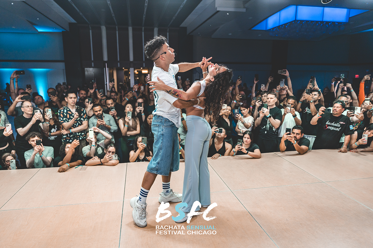 Dancers performing for a festival crowd