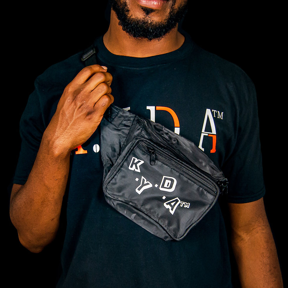 Model Wearing Black Fanny Pack with White "K.Y.D.A 3D" Design