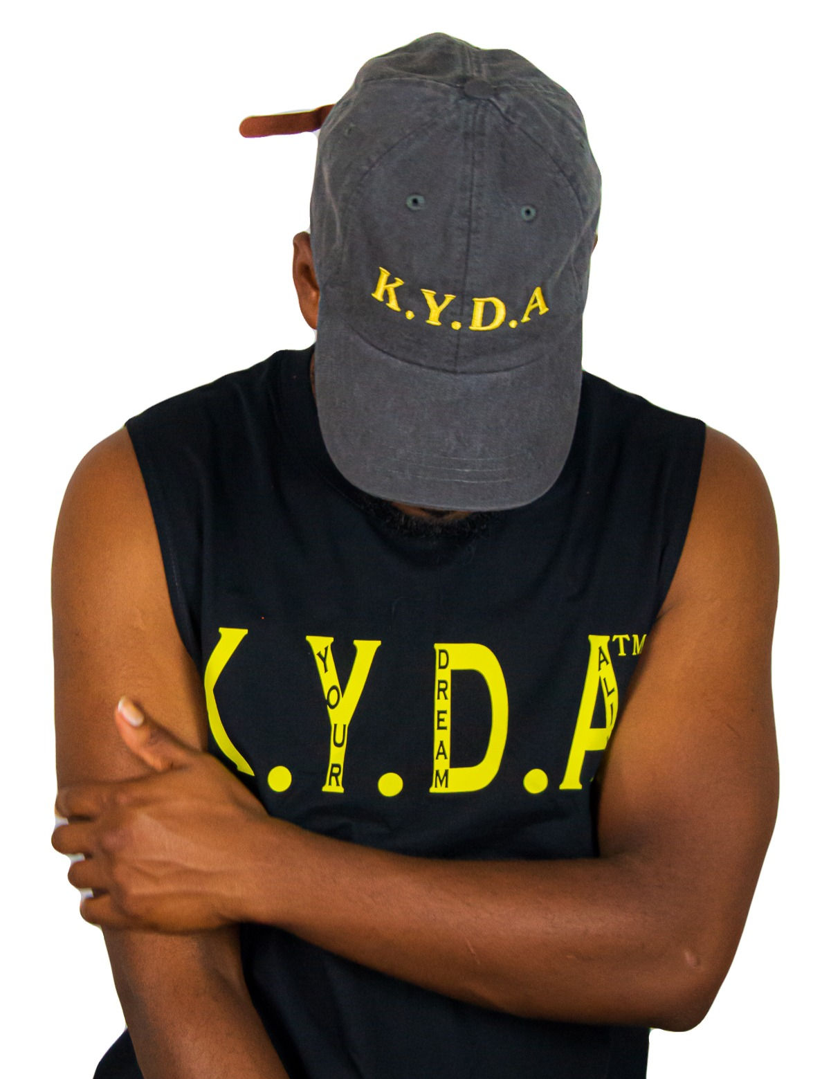 Model Wearing Pigment Black Dad Hat with Yellow "K.Y.D.A" Design