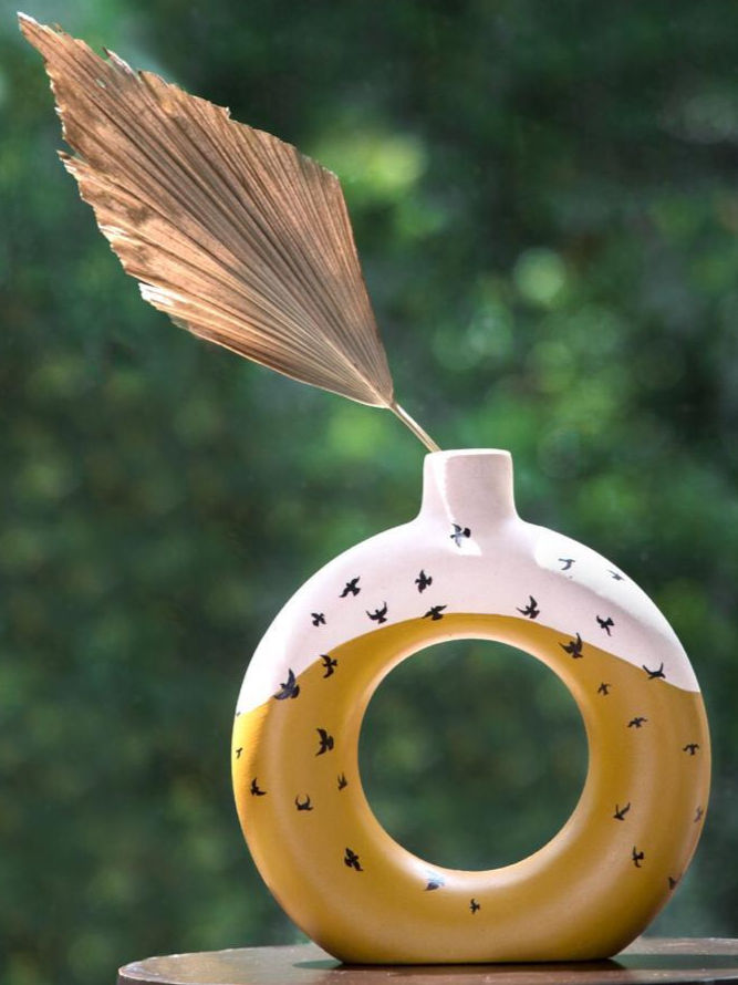 Heaven’s Glow: Golden & White Donut Vase