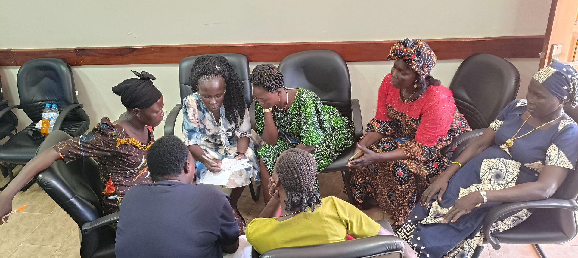 Survivors discussing their views at a National Level Advocacy Workshop in July 2025