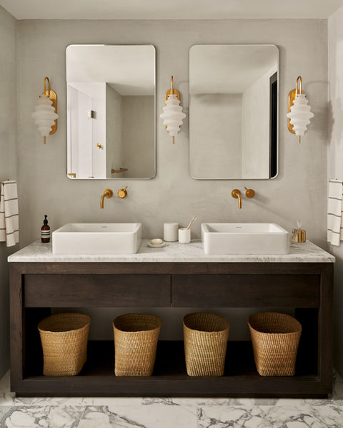 Contemporary double vanity with gold accents.