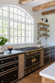 LVZ Design_Full Service Interior Design_Barrie, Ontario_lacornu-stove-black-cabinets.jpg.j