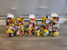 Saying Goodbye with Flowers: Floral 'Nan' Letters Offer Comforting Tribute

The loss of a beloved grandmother is a profound and deeply personal experience. In the midst of grief, finding meaningful ways to express love and remember her unique spirit can bring solace and comfort. Increasingly, families are turning to bespoke floral arrangements to create a beautiful and personalized tribute, and one popular choice is the creation of floral letters spelling out "Nan."

These stunning arrangements, expertly crafted by talented florists, offer a touching visual representation of the special bond shared between grandchildren and their grandmother. Instead of traditional wreaths or sprays, floral 'Nan' letters provide a more contemporary and personalized approach to funeral floral arrangements.
