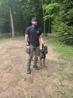 Vince Trusso assisting with K9  new K9 officer